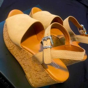 Neutral color wedge sandals by Michael Shannon. Worn once.